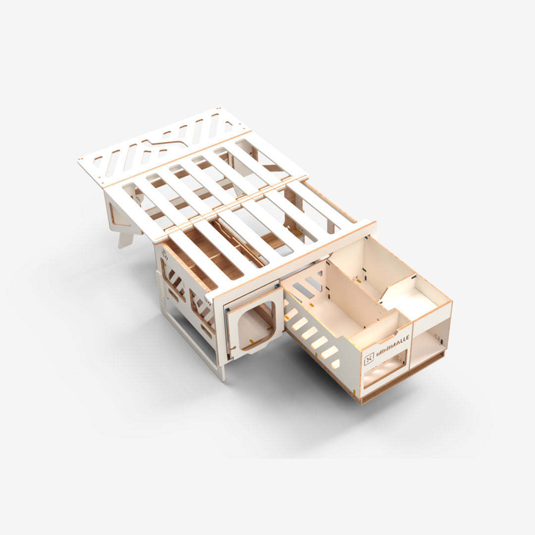 MiniMalle Exokit avec couchage déployable dans le coffre d’un van